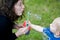 Mother blowing bubbles with toddler