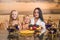 Mother, boy, girl in a beautiful room at the table. Family in the sauna