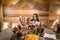 Mother, boy, girl in a beautiful room at the table. Family in the sauna