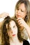 Mother checking child`s head for lice - louse on head