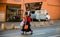 Mother and Child crossing a street in Downtown Johannesburg