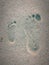 Mother and child footprints on the sand photographed in Ramsgate, South Africa