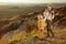 Mother and child hikers on Tuscany summer hike high five