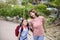 Mother and child holding hands going to school