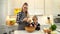 Mother and child making dough for pizza