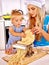 Mother and child making homemade pasta