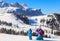 Mother child photographs on the slopes at the ski resort