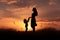 Mother and child silhouettes captured in a heartwarming full shot