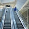 Mother and child together on escalator background. Terminal, airport travel, love care.