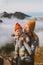 Mother with child travel in mountains family lifestyle woman hiking with infant baby