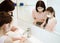 Mother and child wearing face masks and washing  hands during coronavirus  outbreak