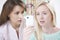 Mother Comforting Daughter Being Bullied By Text Message