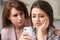 Mother Comforting Daughter Victimized By Text Bullying