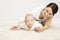 Mother and Crawling Baby, Infant Child Raised Head, Active Kid