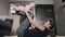 Mother with cute baby doing gymnastic exercise at home