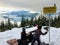 A mother and daugher at Bowen Lookout on Cypress Mountain feeding the birds and enjoying lunch overlooking Howe Sound, B.C.