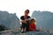 Mother and daughter admire the panorama of Meteora, Greece