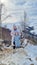 mother and daughter against the backdrop of a winter mountain landscape.