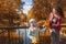 Mother and daughter against the background of autumn. Autumn happiness.