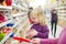 Mother and daughter in bakery in supermarket