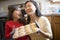 Mother and daughter baking muffins