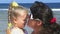 Mother and daughter at beach.