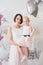 Mother and daughter in beautiful outfits celebrate the holiday