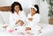 Mother Daughter Beauty Treatments. Black Mom Teaching Little Girl Self-Care At Home