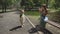 Mother and daughter blowing soap bubbles.