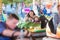 Mother and daughter in bumper car at fun fair