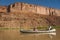 Mother and daughter in canoes on desert river