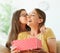 mother daughter child woman family gift girl present day birthday happy love celebration holiday happiness surprise kiss