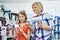 Mother and daughter chooses a hairdryer in shop