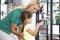 Mother And Daughter Choosing Glasses In Opticians