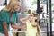 Mother And Daughter Choosing Glasses In Opticians