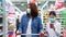 Mother and daughter doing shopping in supermarket during pandemic