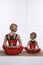 Mother and daughter doing yoga exercise, fitness, gym wearing th