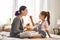 Mother and daughter eating salad