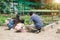 Mother and daughter engaged in gardening together