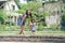 Mother and daughter engaged in gardening together