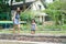 Mother and daughter engaged in gardening together