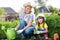 Mother and daughter engaged in gardening together