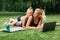 Mother and daughter are engaged in outdoor sports online near their home. The family plays sports together from home. Healthy