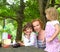 Mother daughter family picnic outdoor park