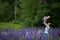 Mother & Daughter in Field of Lupine Flowers