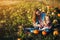 Mother and daughter on a field with pumpkins