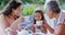 Mother, daughter and granny toasting the tea cups in the garden 4K 4k