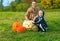 Mother and daughter among Halloween pumpkins Jack Oâ€™Lantern