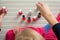 Mother and daughter having fun painting fingernails, view from above