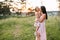 Mother and daughter having fun in the park. Happiness and harmony in family life. Beauty nature scene with family outdoor